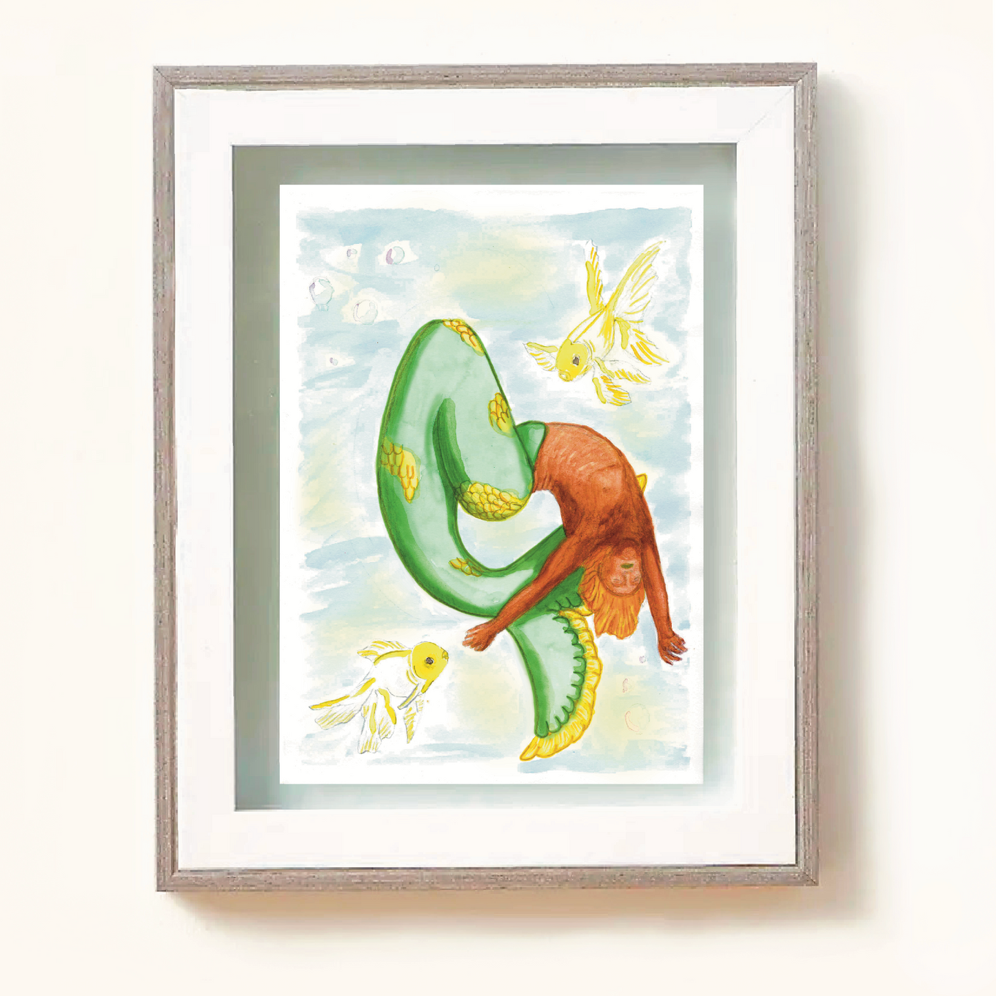 Framed art print of Citrus mermaid. Citrus mermaid dancing in a whirlwind shape bending backwards accompanied by two white and yellow goldfiish. Citrus has orange toned skin and a green tail with patches of yellow scales.