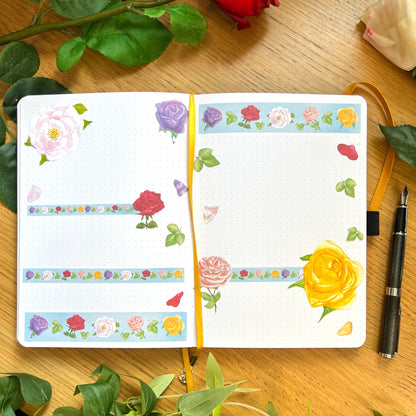 Journal double page spread decorated with die cut, Washi strips and decorative stickers of roses in a variety of vibrant colours