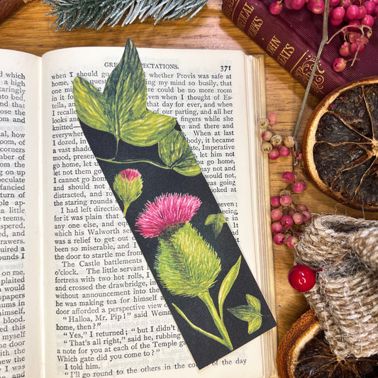 Winters bloom thistle and ivy illustrated bookmark cut at the top to the shape of the ivy leaf