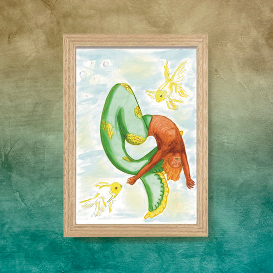 Citrus mermaid swimming with yellow goldfish watercolour painting in wooden frame on a sea green ombré wall