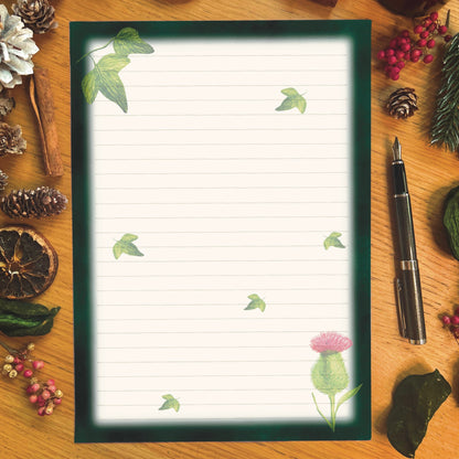 Winters bloom letter writing page.  Thistle and ivy illustrated page with dark green border