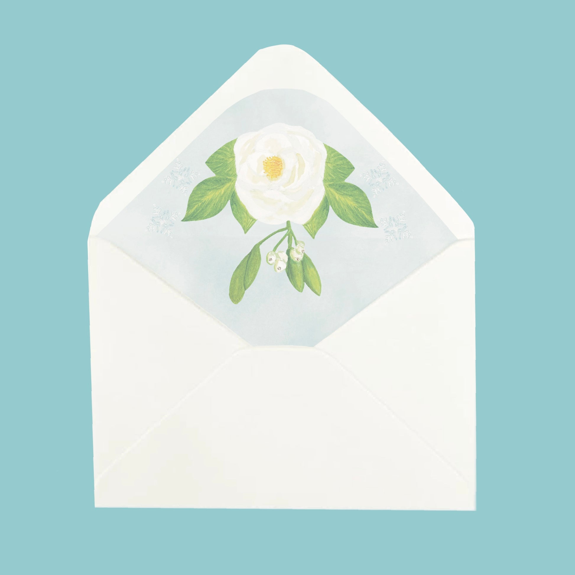 White envelope on ice blue background with a white rose illustrated inlay