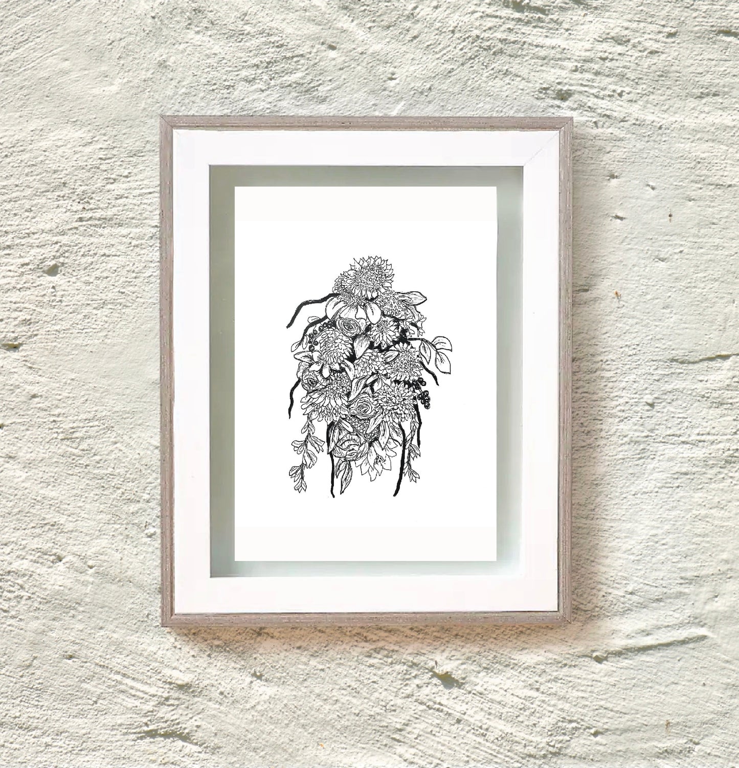 Wildflower bouquet ink drawing print in white frame on white wall